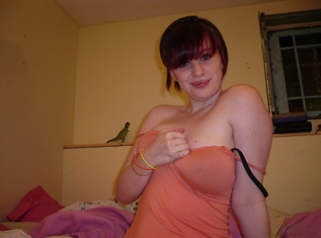 Redheaded amateur teases on her bed while wearing striped underwear 50251398